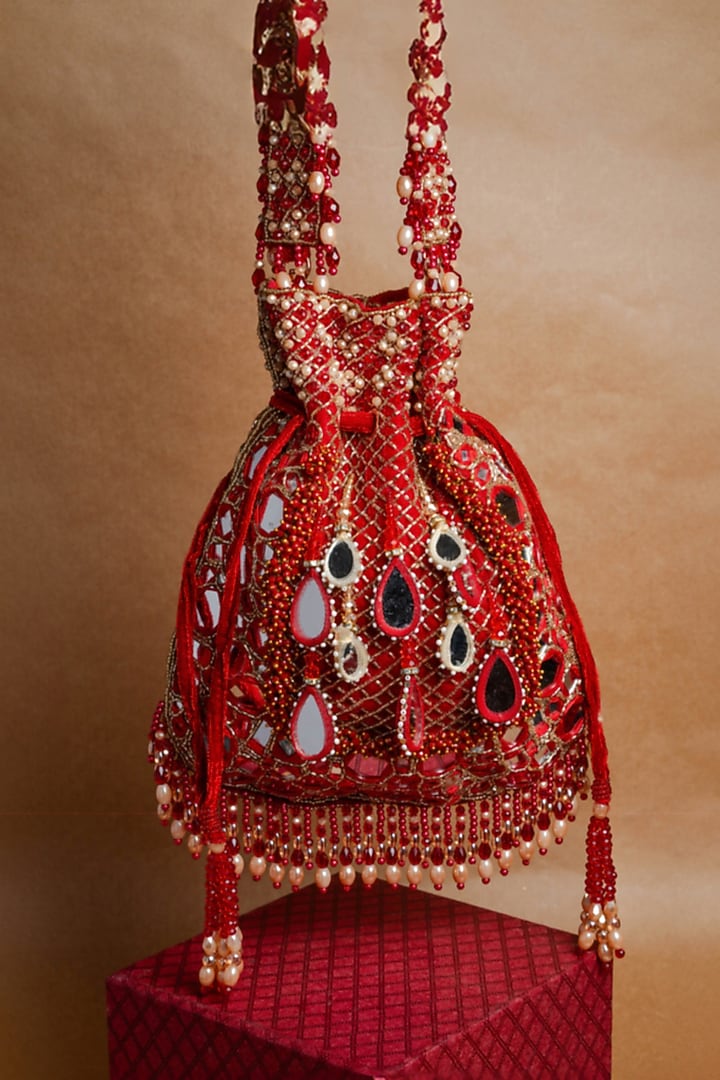 Red Silk Mirror Embroidered Potli Bag by Nayaab by Sonia at Pernia's Pop Up Shop