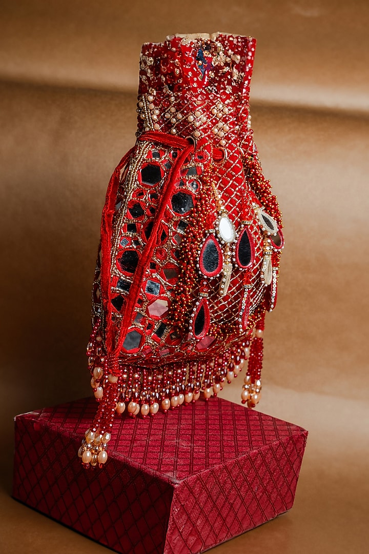 Red Silk Mirror Embroidered Potli Bag by Nayaab by Sonia at Pernia's Pop Up Shop