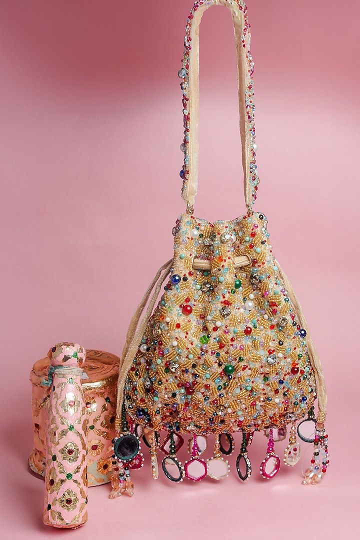 Gold Silk Mirror Embroidered Potli Bag by Nayaab by Sonia at Pernia's Pop Up Shop