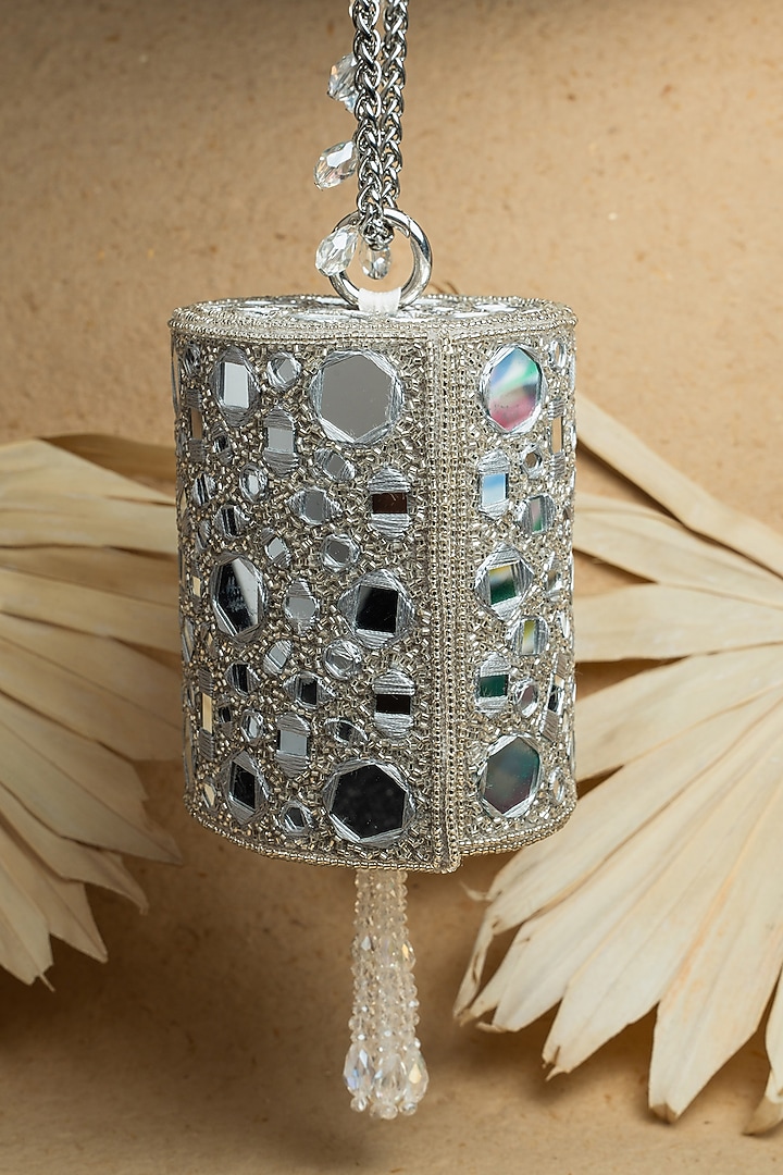 Silver Silk Mirror Embroidered Cylindrical Potli Bag by Nayaab by Sonia at Pernia's Pop Up Shop