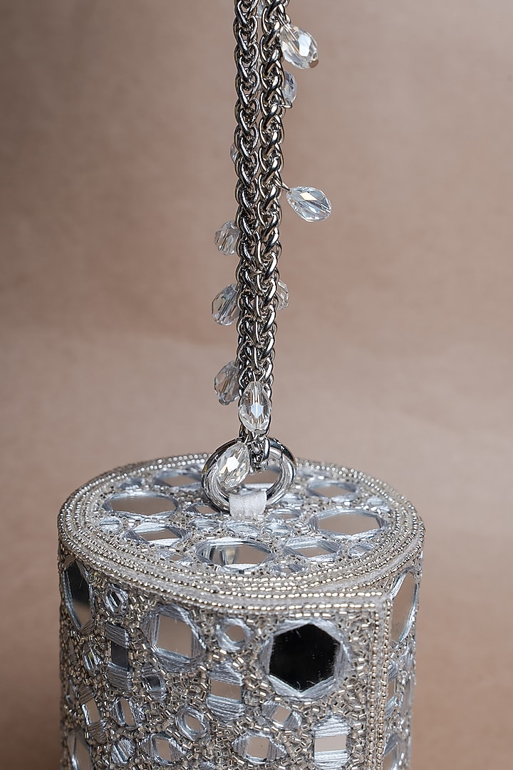 Silver Silk Mirror Embroidered Cylindrical Potli Bag by Nayaab by Sonia at Pernia's Pop Up Shop
