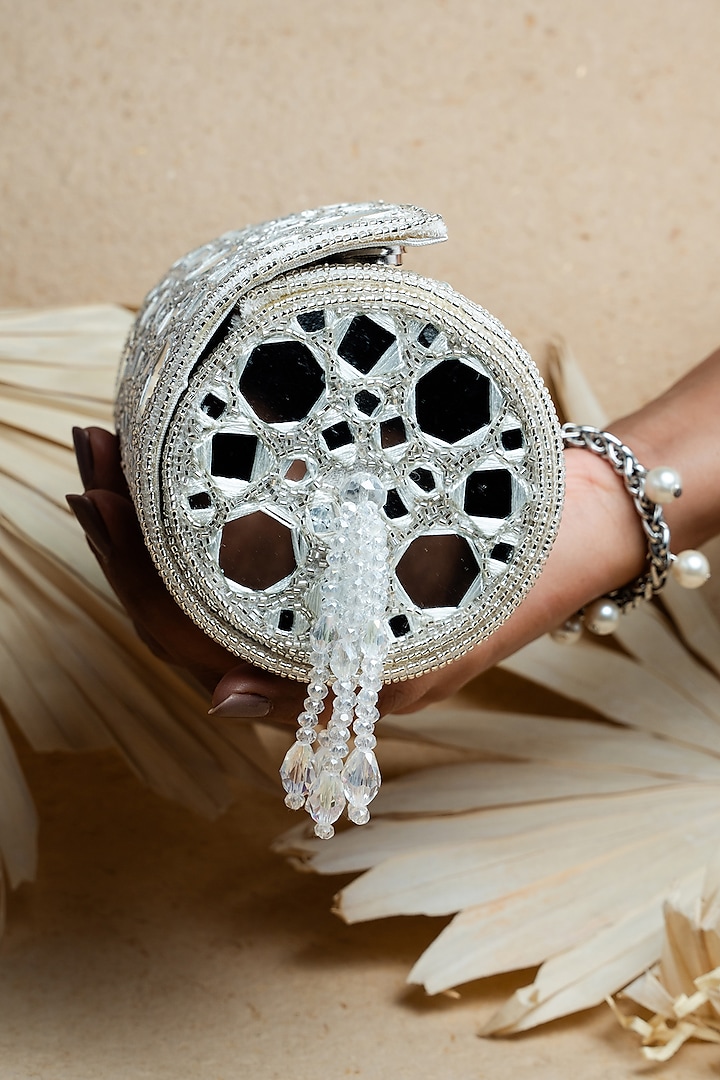 Light Silver & White Silk Mirror Embroidered Cylindrical Potli Bag by Nayaab by Sonia at Pernia's Pop Up Shop