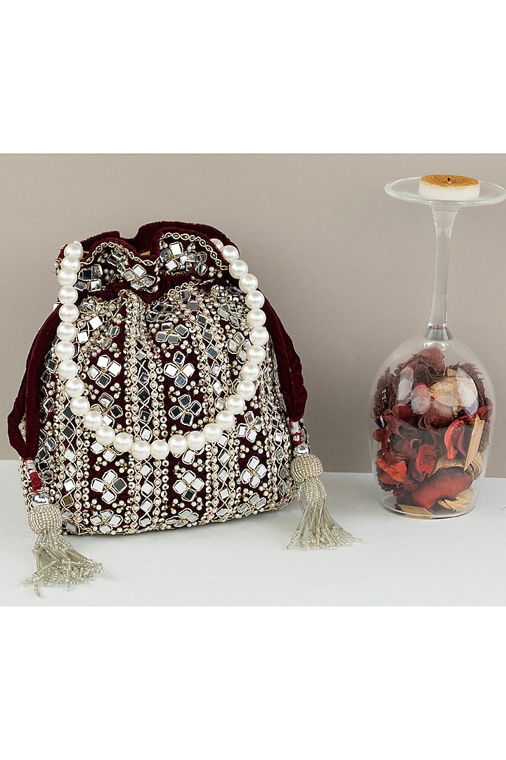 Red Suede Mirror Embroidered Potli Bag by Nayaab by Sonia at Pernia's Pop Up Shop