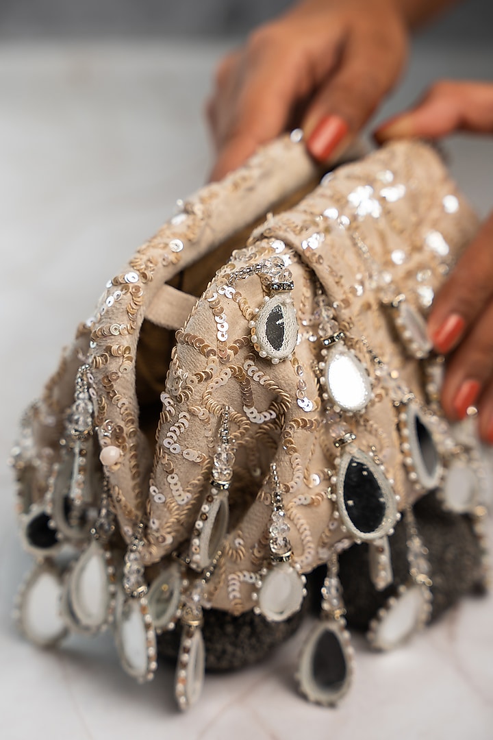 Off-White Silk Mirror Work Clutch by Nayaab by Sonia at Pernia's Pop Up Shop