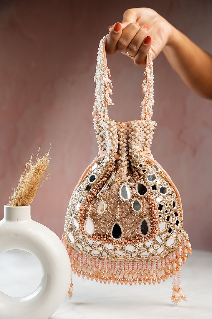 Pink Silk Mirror Work Potli by Nayaab by Sonia at Pernia's Pop Up Shop