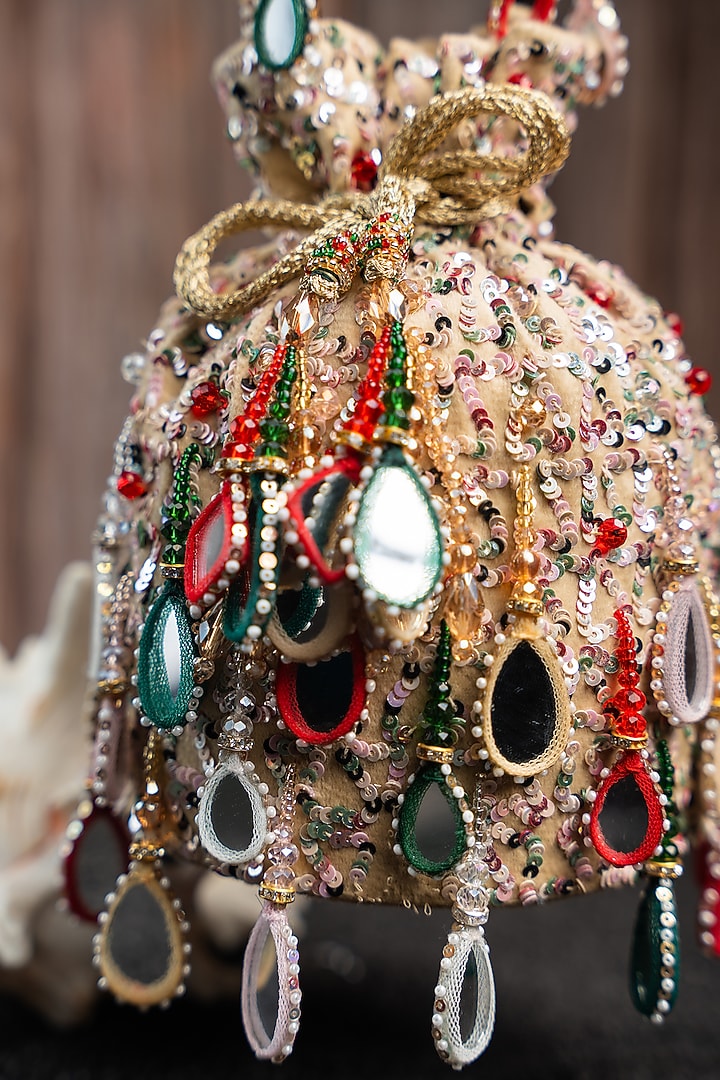 Off-White Silk Mirror Work Potli by Nayaab by Sonia at Pernia's Pop Up Shop