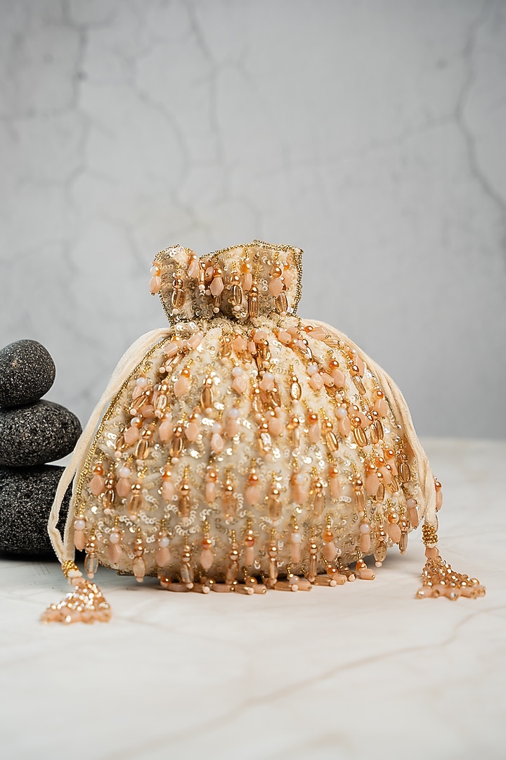 Cream Silk Bead Work Potli by Nayaab by Sonia at Pernia's Pop Up Shop