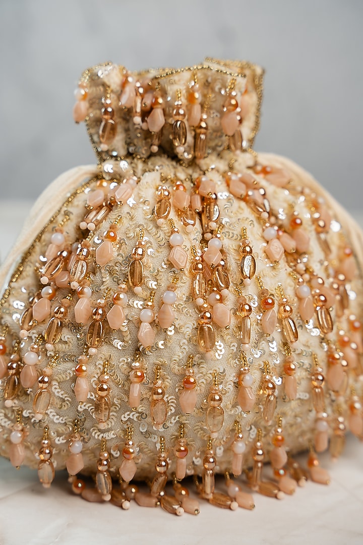 Cream Silk Bead Work Potli by Nayaab by Sonia at Pernia's Pop Up Shop