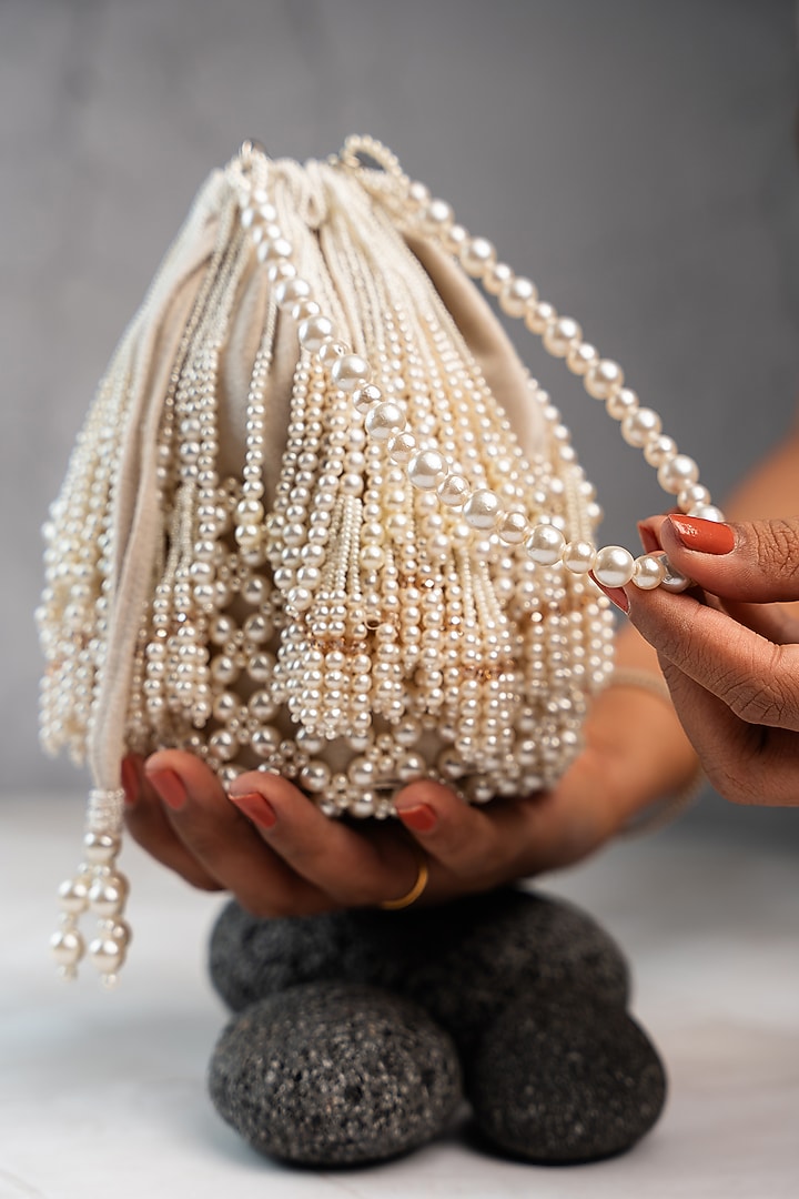 White Suede Bead Work Potli by Nayaab by Sonia at Pernia's Pop Up Shop