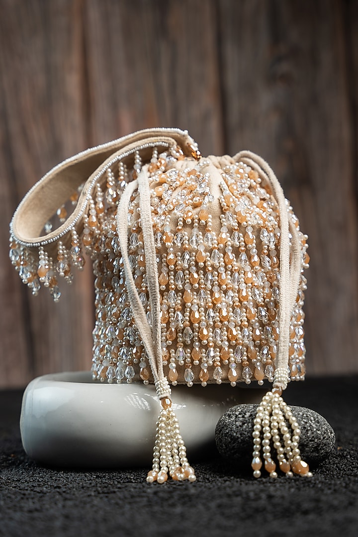 Cream & Gold Suede Bead Work Potli by Nayaab by Sonia at Pernia's Pop Up Shop