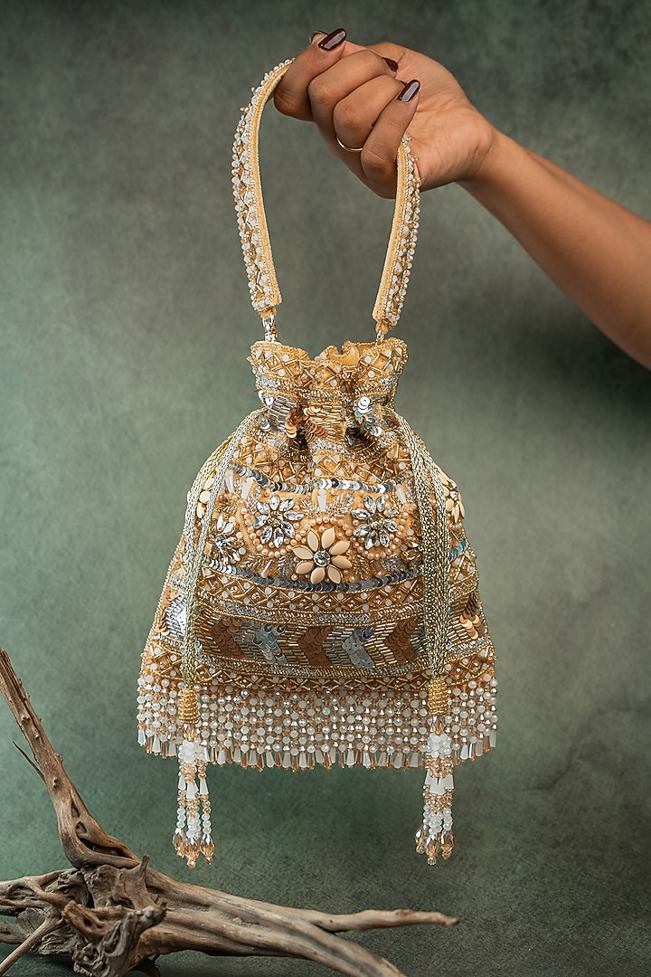 Gold Silk Floral & Sequin Embroidered Potli Bag by Nayaab by Sonia at Pernia's Pop Up Shop