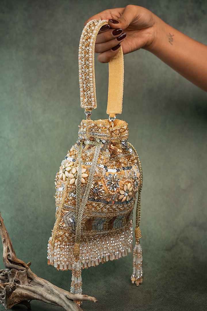 Gold Silk Floral & Sequin Embroidered Potli Bag by Nayaab by Sonia at Pernia's Pop Up Shop
