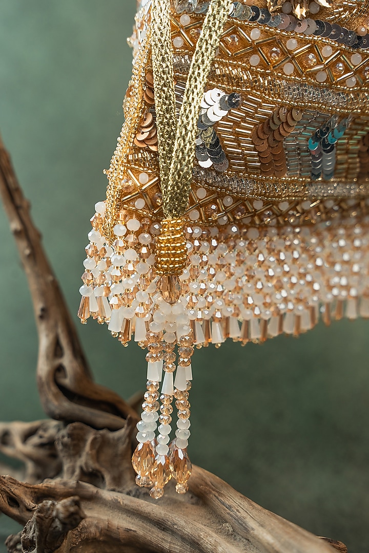 Gold Silk Floral & Sequin Embroidered Potli Bag by Nayaab by Sonia at Pernia's Pop Up Shop