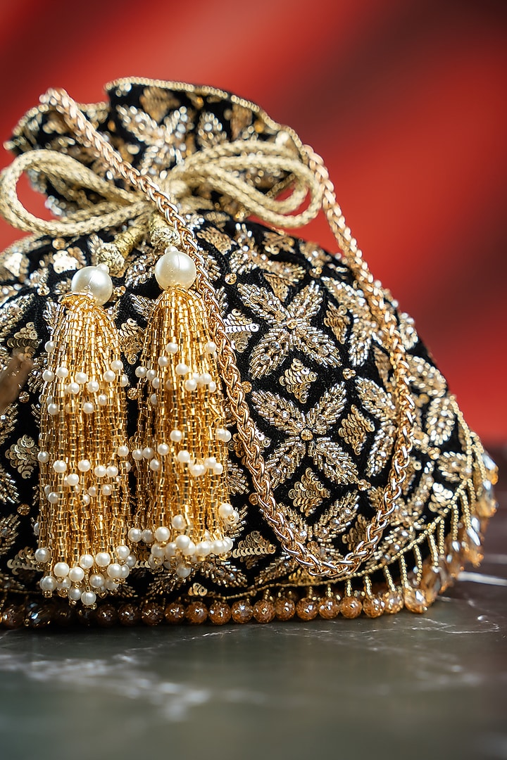 Black & Antique Gold Velvet Embroidered Potli by Nayaab by Sonia at Pernia's Pop Up Shop
