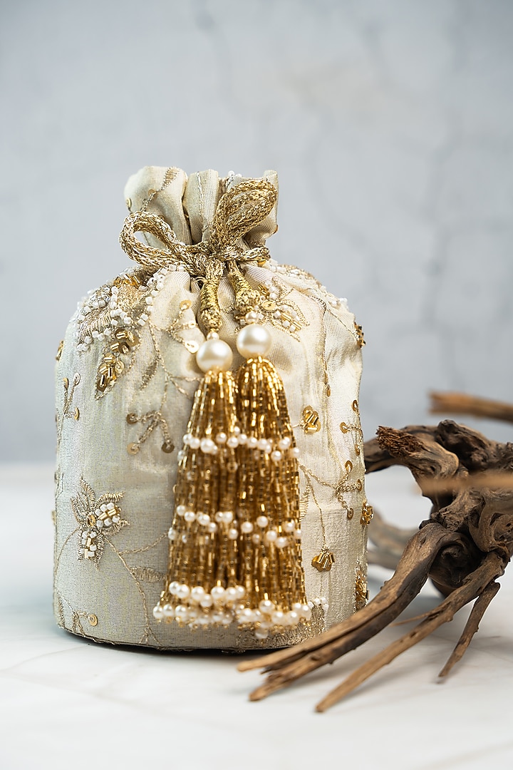 Off-White Jute Sequins & Bead Embroidered Bucket Bag by Nayaab by Sonia at Pernia's Pop Up Shop
