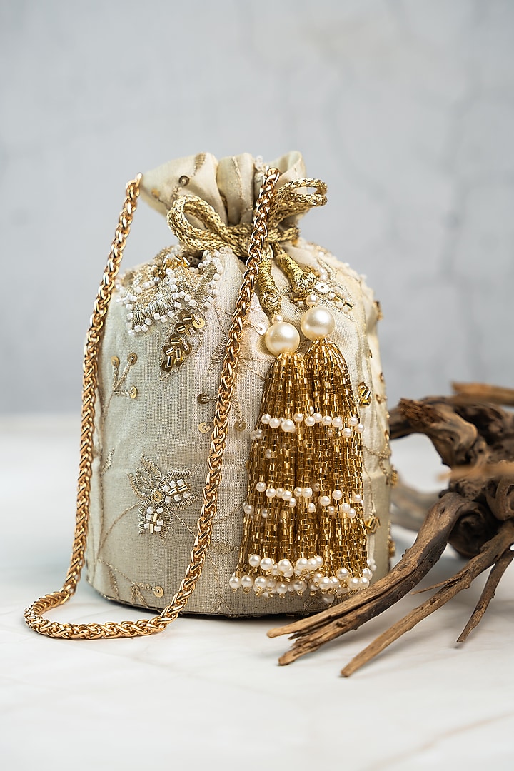 Off-White Jute Sequins & Bead Embroidered Bucket Bag by Nayaab by Sonia at Pernia's Pop Up Shop