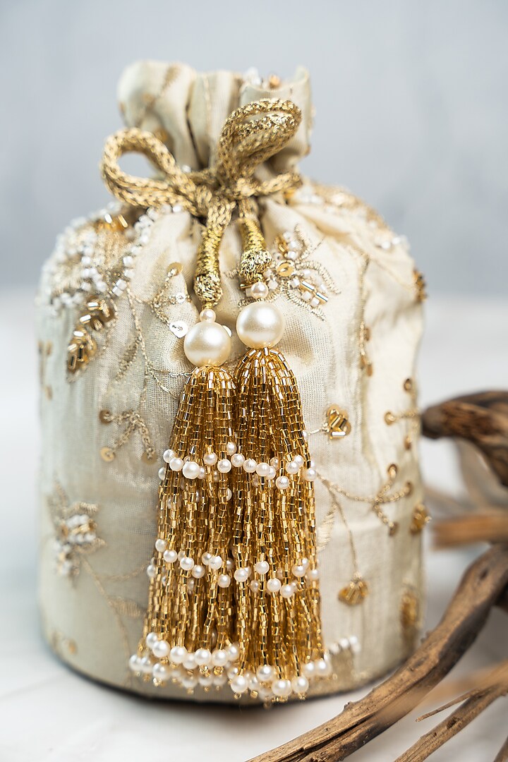 Off-White Jute Sequins & Bead Embroidered Bucket Bag by Nayaab by Sonia at Pernia's Pop Up Shop