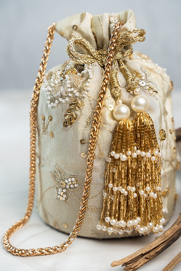 Off-White Jute Sequins & Bead Embroidered Bucket Bag by Nayaab by Sonia at Pernia's Pop Up Shop