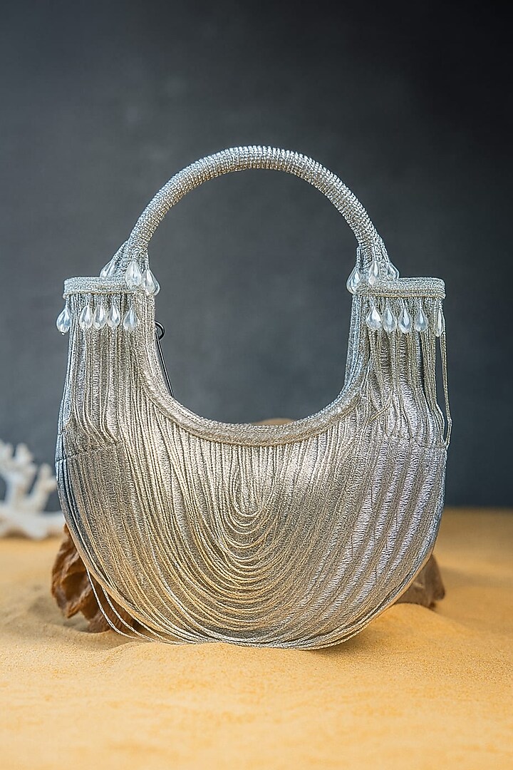 Silver Metallic Chain Boat-Shaped Bag by Nayaab by Sonia at Pernia's Pop Up Shop