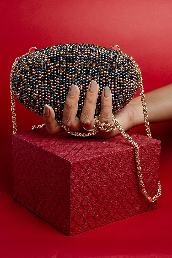 Black & Copper Silk Bead Embroidered Oval Clutch by Nayaab by Sonia at Pernia's Pop Up Shop