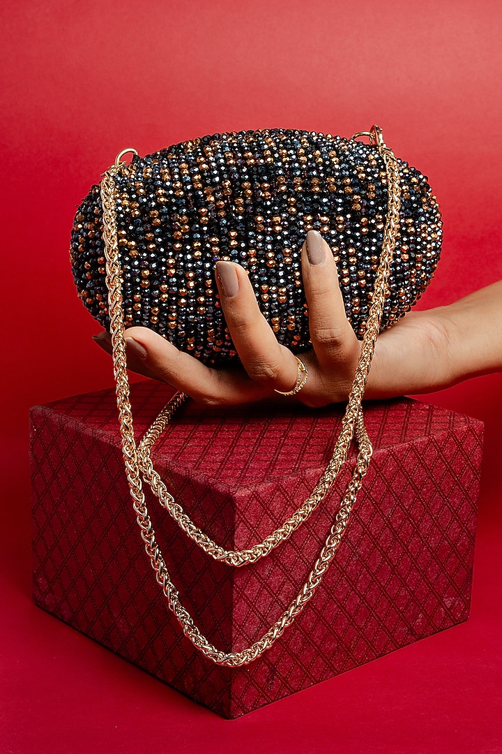 Black & Copper Silk Bead Embroidered Oval Clutch by Nayaab by Sonia at Pernia's Pop Up Shop