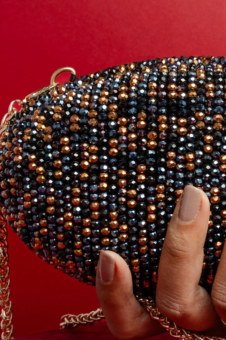 Black & Copper Silk Bead Embroidered Oval Clutch by Nayaab by Sonia at Pernia's Pop Up Shop