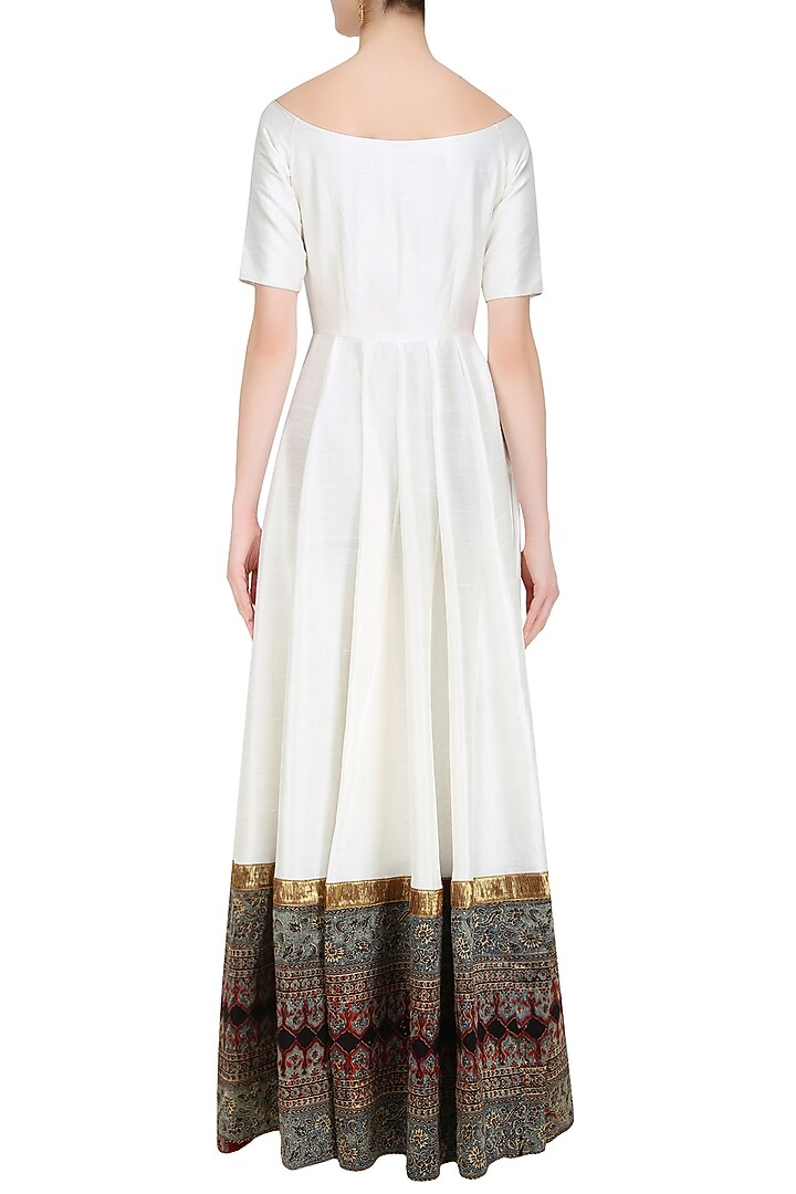 White zardozi embroidered off shoulder floor length anarakli with gold pants available only at Pernia's Pop Up Shop.