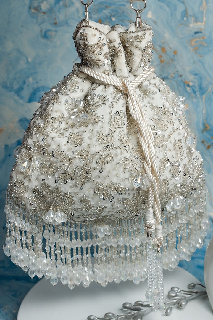 Silverish White Silk Sequins Embroidered Potli by Nayaab by Sonia at Pernia's Pop Up Shop
