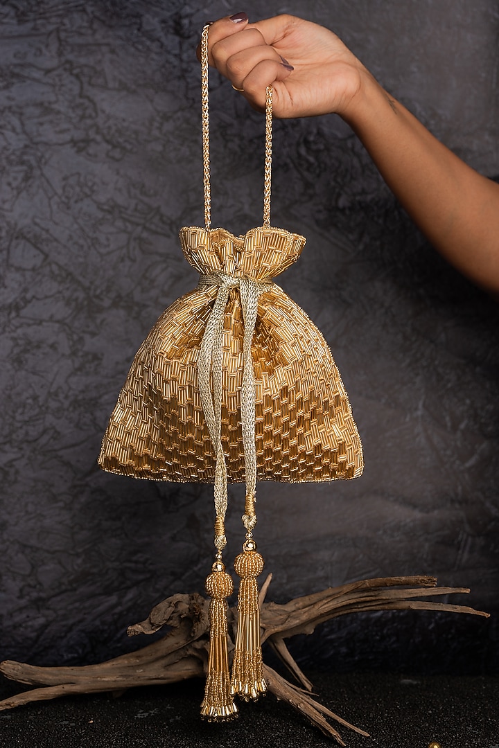 Light Gold Silk Embroidered Potli by Nayaab by Sonia at Pernia's Pop Up Shop