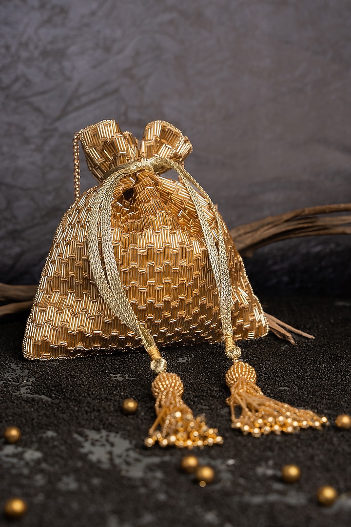 Light Gold Silk Embroidered Potli by Nayaab by Sonia at Pernia's Pop Up Shop