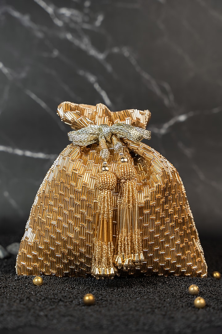 Light Gold Silk Embroidered Potli by Nayaab by Sonia at Pernia's Pop Up Shop