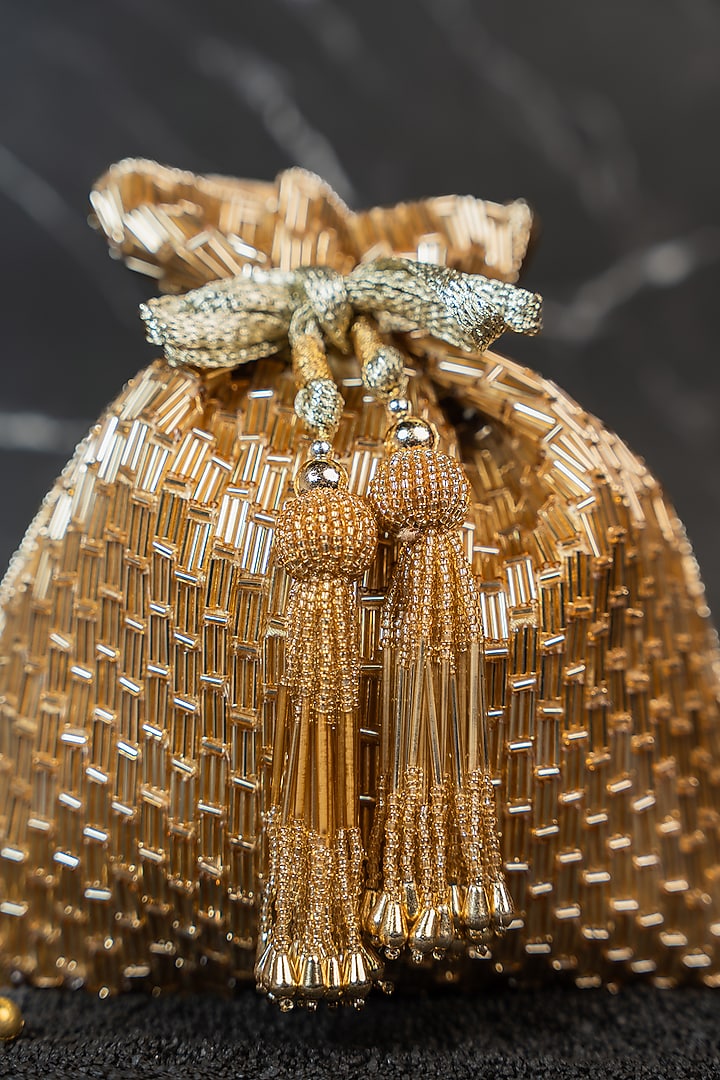 Light Gold Silk Embroidered Potli by Nayaab by Sonia at Pernia's Pop Up Shop