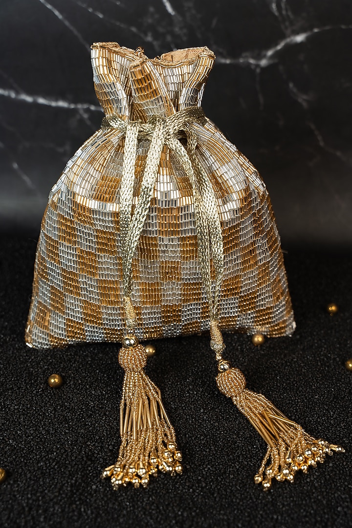 Light Gold Silk Embroidered Potli by Nayaab by Sonia at Pernia's Pop Up Shop