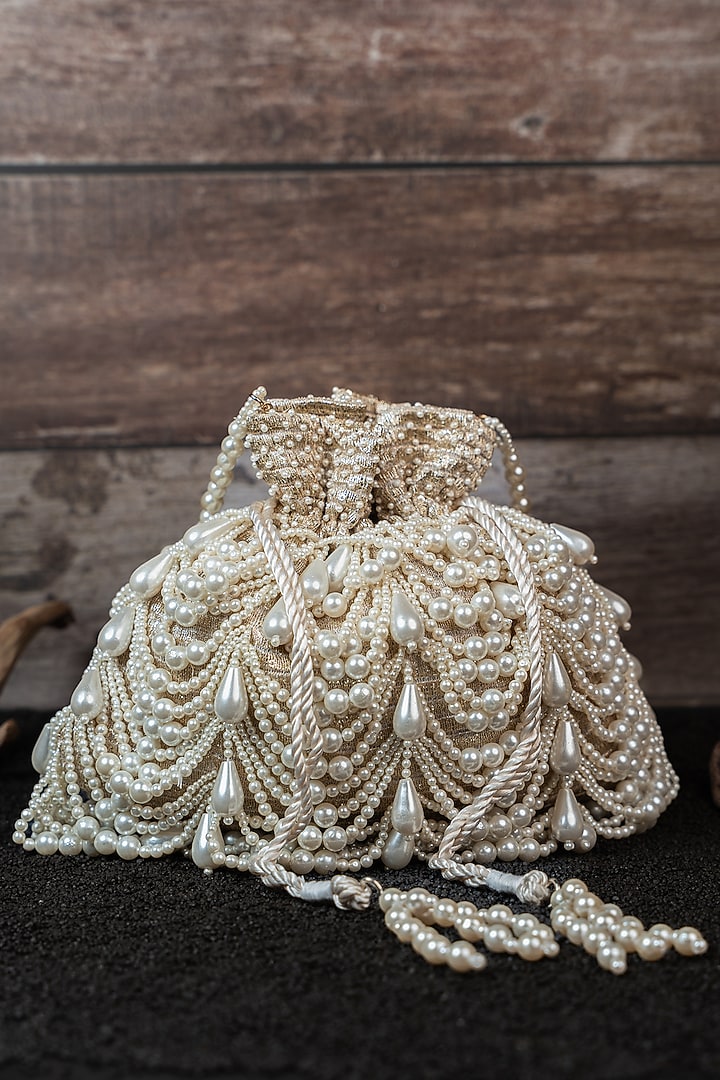 Light Gold Velvet Embroidered Potli by Nayaab by Sonia at Pernia's Pop Up Shop