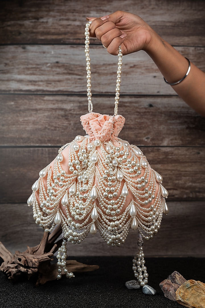 Blush Pink Velvet Pearl Work Potli by Nayaab by Sonia at Pernia's Pop Up Shop