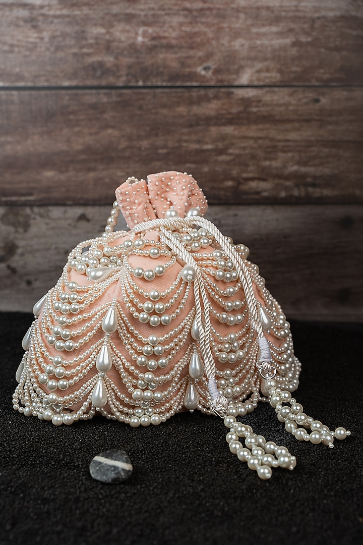 Blush Pink Velvet Pearl Work Potli by Nayaab by Sonia at Pernia's Pop Up Shop