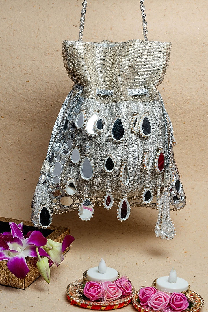 Silver Silk Mirror Embroidered Potli Bag by Nayaab by Sonia at Pernia's Pop Up Shop