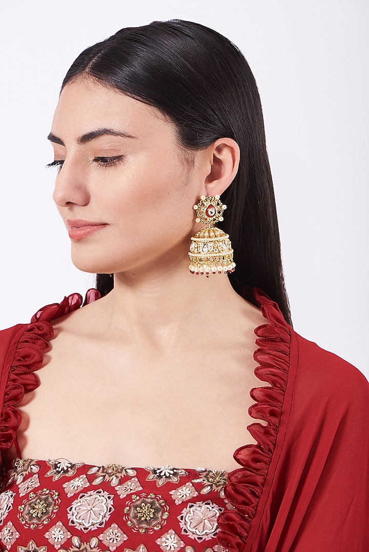 Gold Finish Jhumka Earrings With Kundan Polki by Nepra By Neha Goel at Pernia's Pop Up Shop