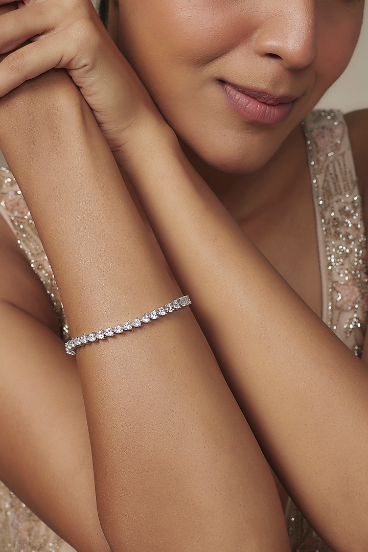 White Rhodium Finish Zircon Tennis Bracelet by Nepra By Neha Goel at Pernia's Pop Up Shop