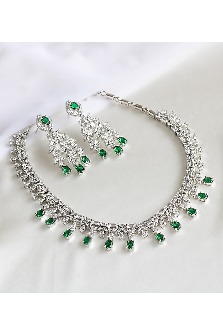 White Finish Faux Diamond & Green Stones Necklace Set by Nepra By Neha Goel