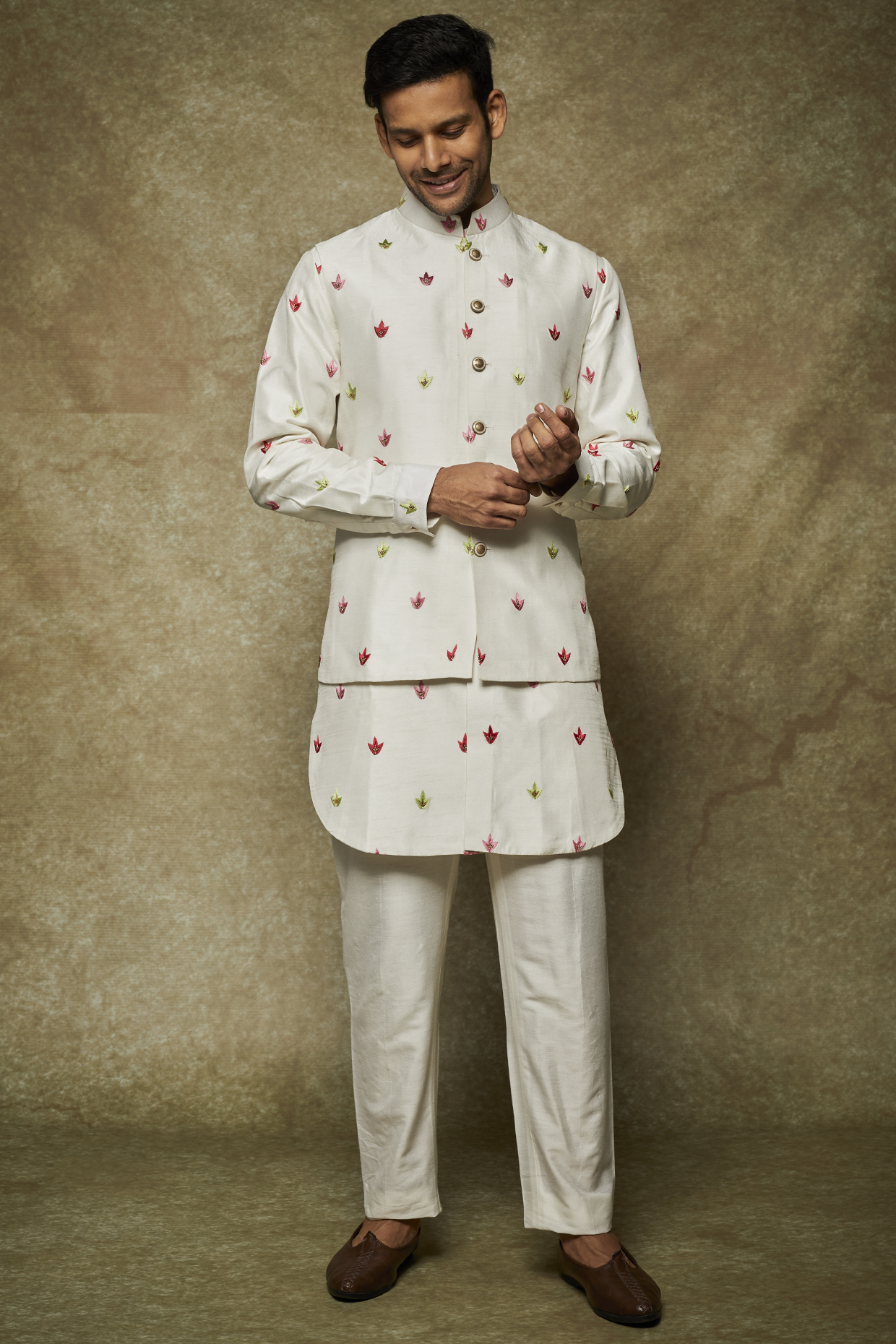 White Dupion Silk Machine Embroidered Bundi Jacket Set by Nero by Shaifali & Satya at Pernia's Pop Up Shop