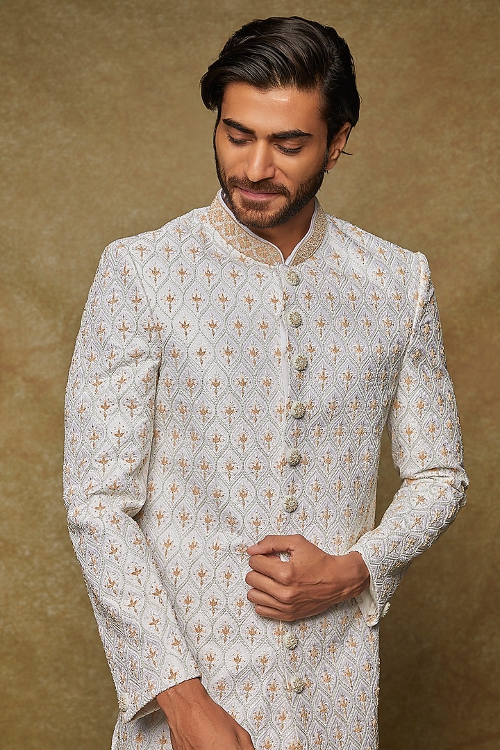 White Silk Lucknowi Embroidered Groom Sherwani Set by Nero by Shaifali & Satya at Pernia's Pop Up Shop