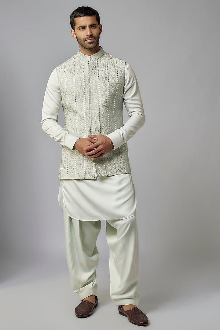 Green Silk Thread Work Bundi Jacket Set by Nero by Shaifali & Satya