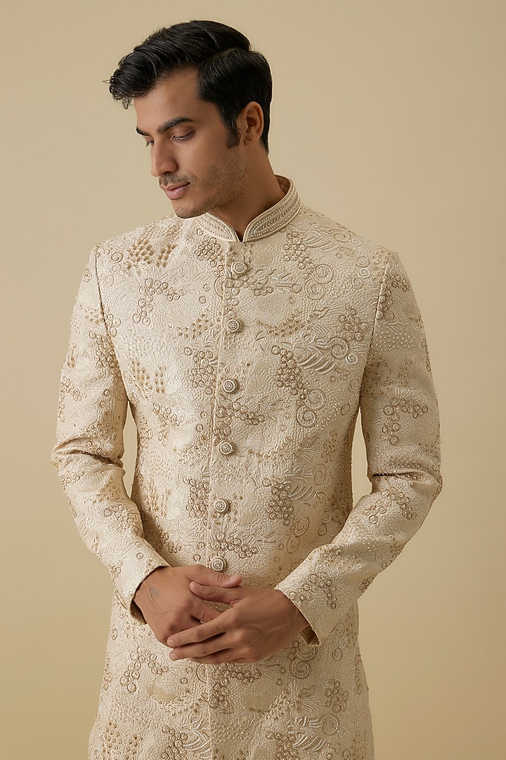 Ivory Lucknowi Handwork Groom Sherwani Set by Nero By Shaifali & Satya at Pernia's Pop Up Shop