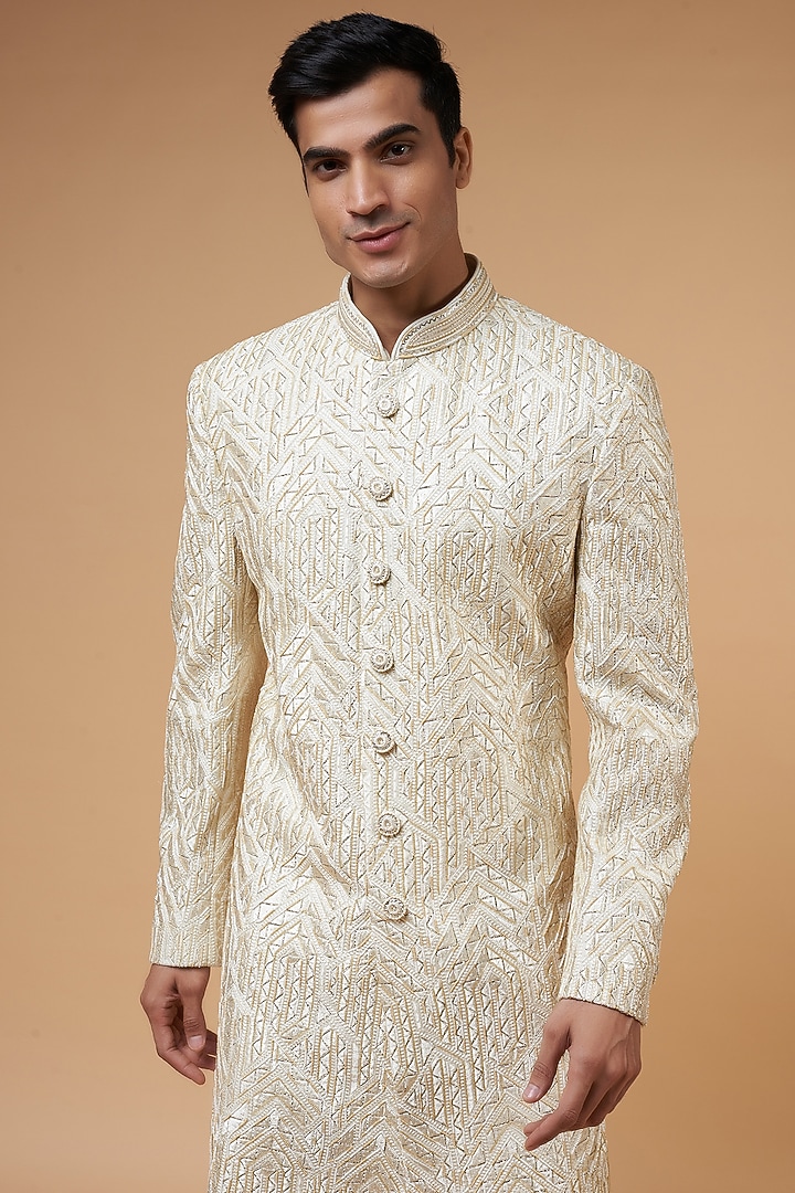 Ivory Dupion Silk Thread Embroidered Groom Sherwani Set by Nero by Shaifali & Satya at Pernia's Pop Up Shop
