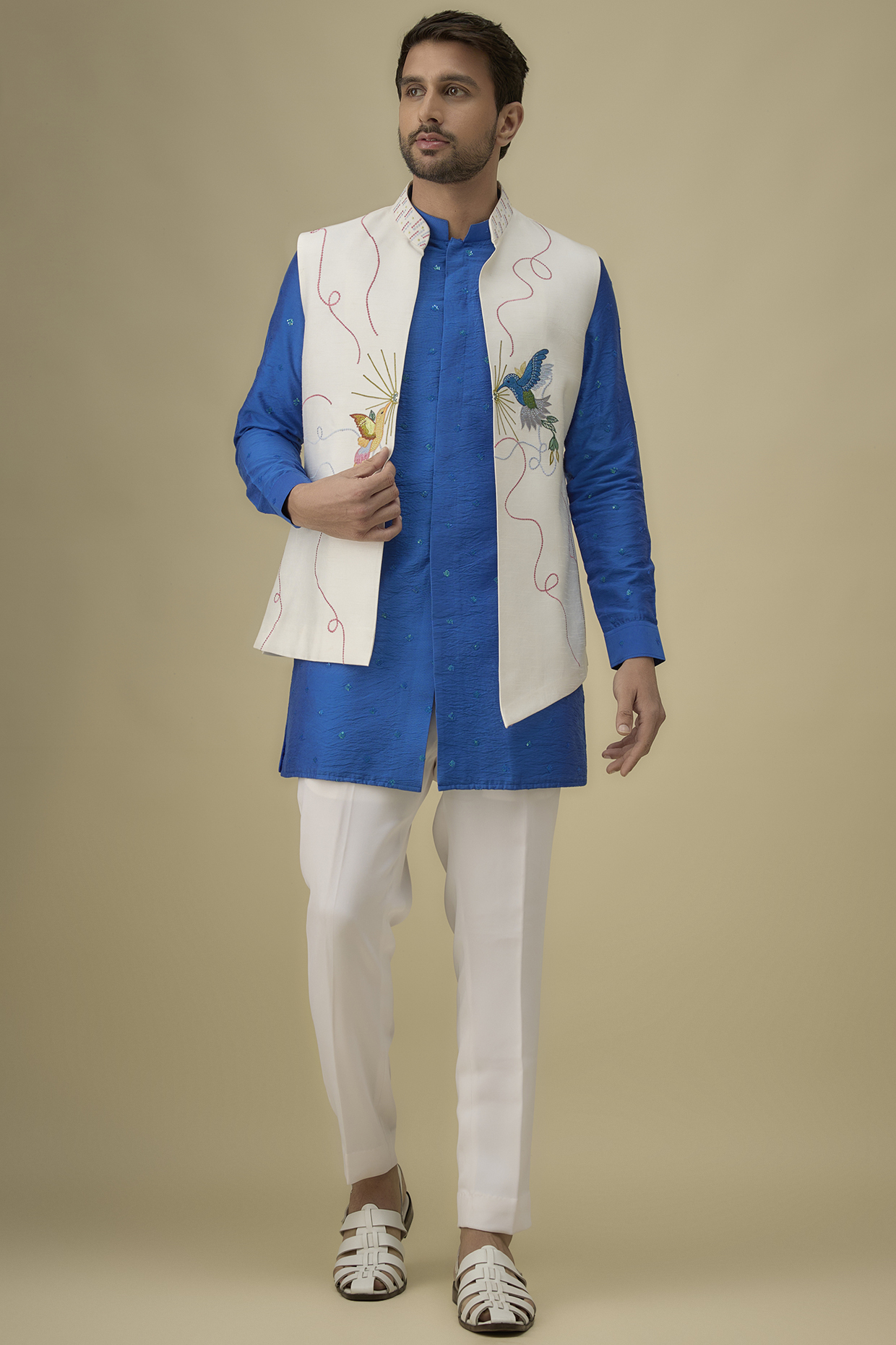 White Silk Thread Work Bundi Jacket Set by Nero by Shaifali & Satya