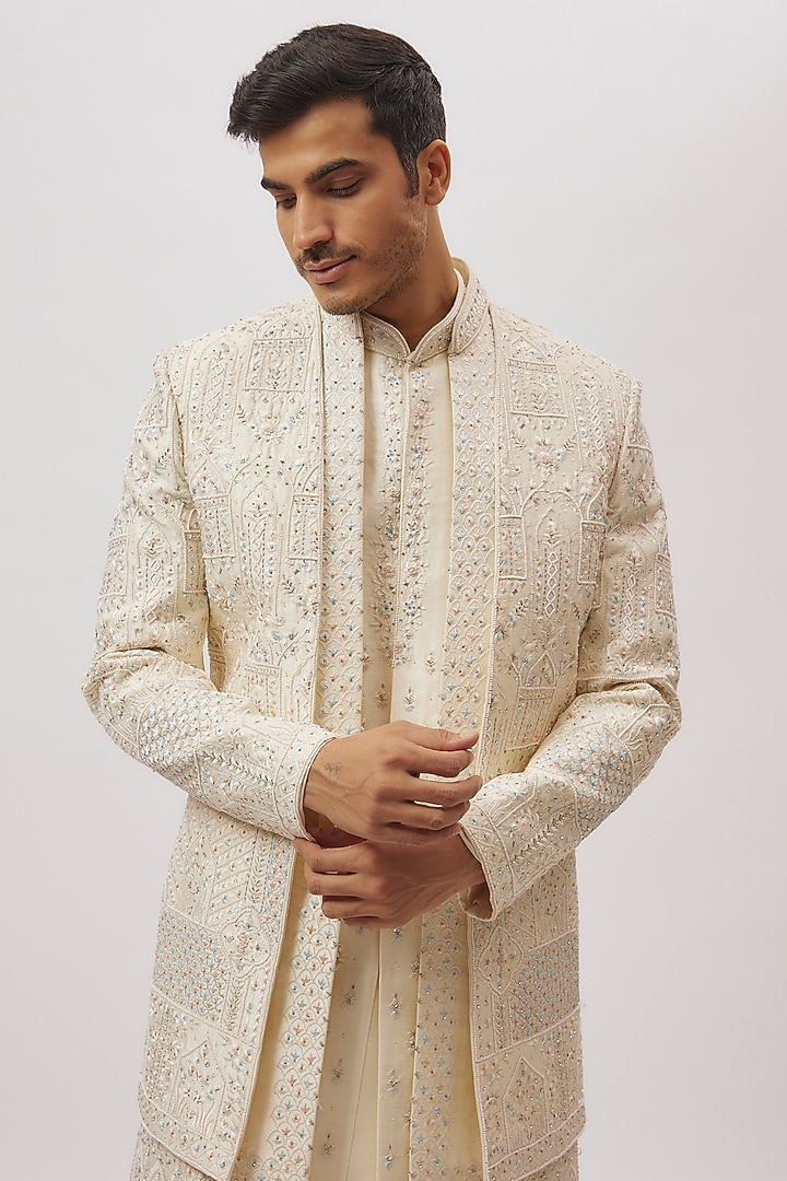 Ivory Silk Floral Printed & Machine Embroidered Groom Sherwani Set by Nero By Shaifali & Satya at Pernia's Pop Up Shop
