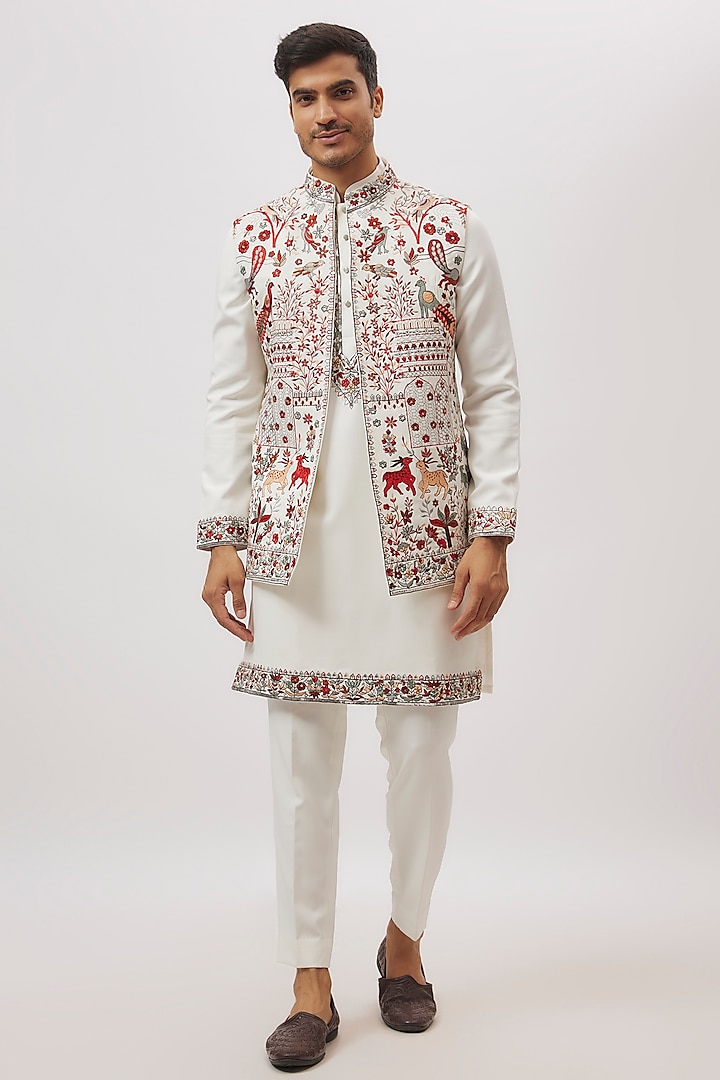 White Raw Silk Floral Printed & Machine Embroidered Bundi Jacket Set by Nero By Shaifali & Satya at Pernia's Pop Up Shop