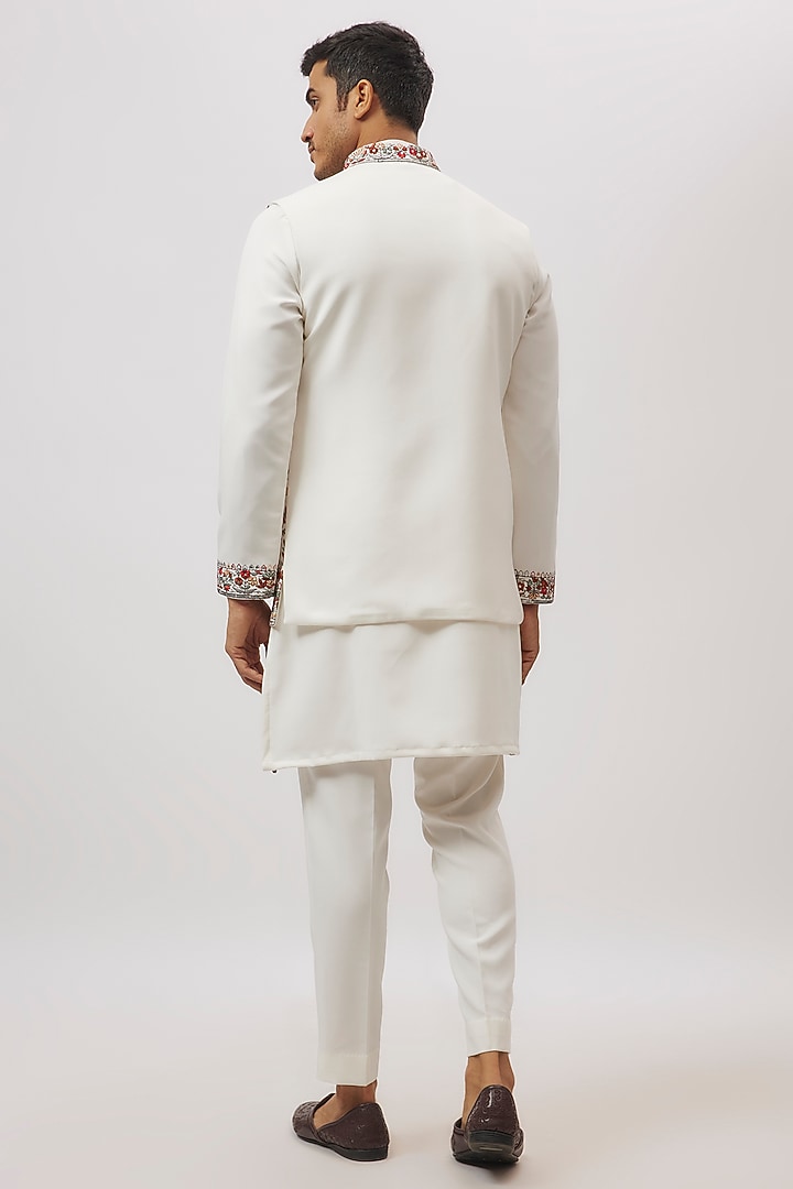 White Raw Silk Floral Printed & Machine Embroidered Bundi Jacket Set by Nero By Shaifali & Satya at Pernia's Pop Up Shop