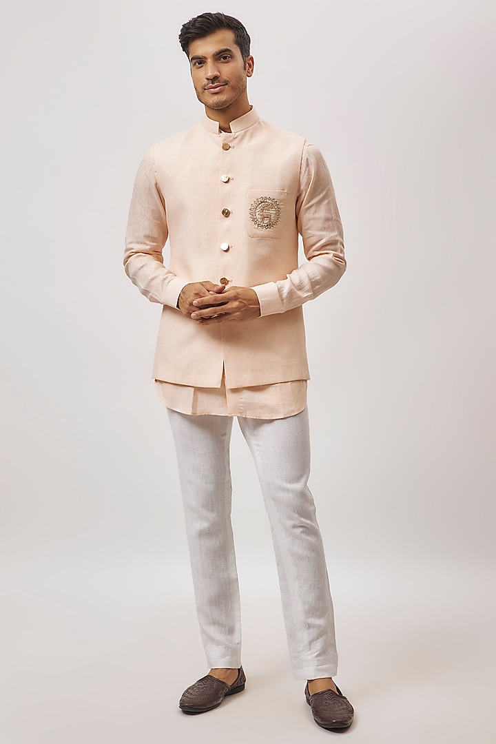 Peach Linen hand Embroidered Bundi Jacket Set by Nero By Shaifali & Satya